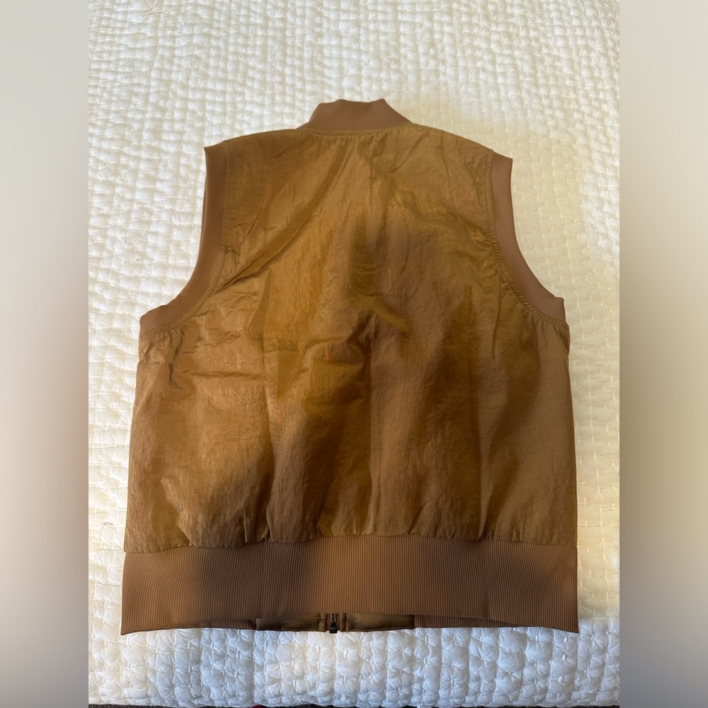 Women’s lululemon size 6 gold insulated vest. Like new.